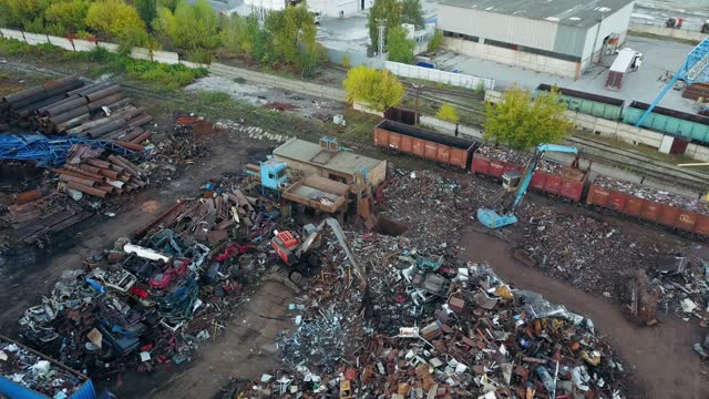 Metal recycling industry. Drone aerial view of scrap yard