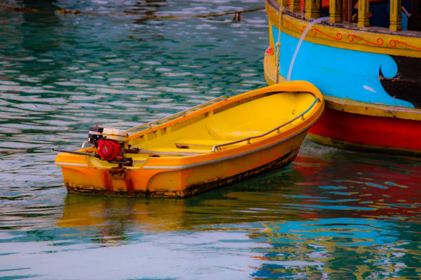 Holidays in Malta - Traditional maltese fishing boat in fishing village