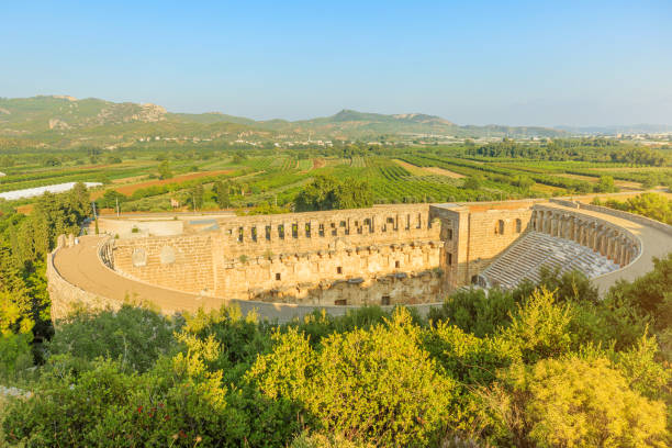 roman theatre in aspendos archaeological site - aerial view city urban scene italy foto e immagini stock