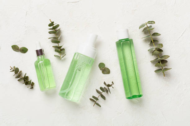 istock Herbal face care products on concrete background, top view 2102461704