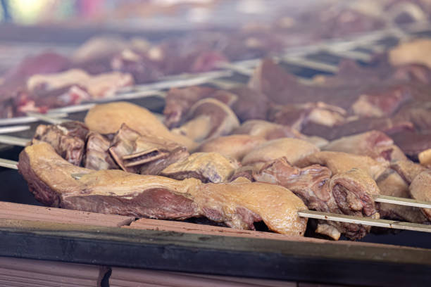 istock meat at brazilian barbecue event 2102472383