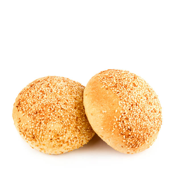 istock Buns with sesame seeds isolated on a white. Free space for text. 2102510060