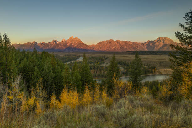 istock Dawn at The Snake River And The Grand Tetons 2102519131
