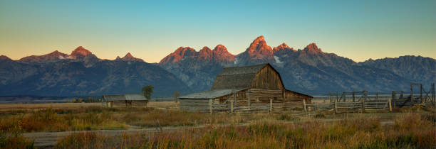 istock Sunrise Over John Moulton Barn 2102519136