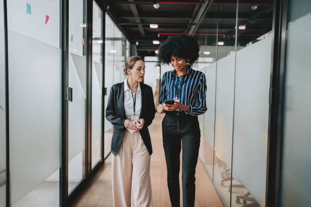 Employees walking down the company corridor
