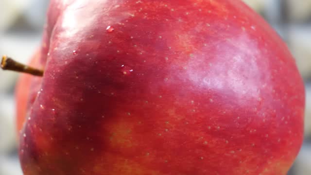 Red large apples of the Gala variety, fruits close-up.