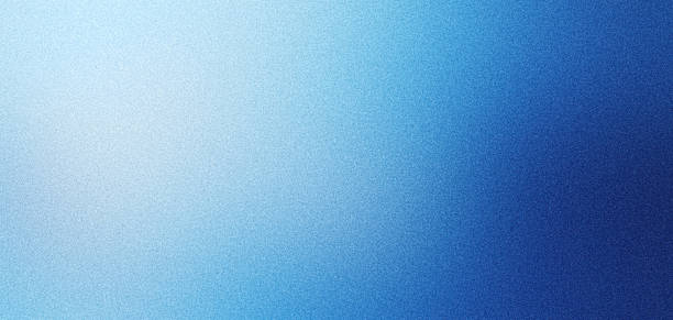 istock Blue grainy gradient noisy background, light to dark azure sapphire cerulean denim blue smooth noise texture banner backdrop design 2102559970