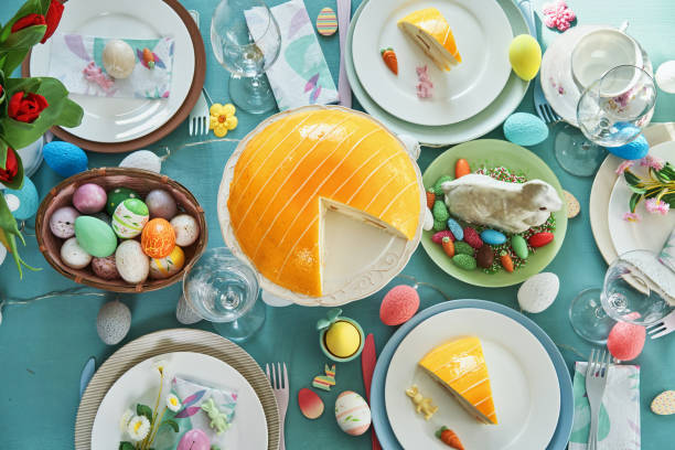 istock Easter Lunch with Roast Pork, Vegetables, Easter Cookies and Easter Cake 2102575344
