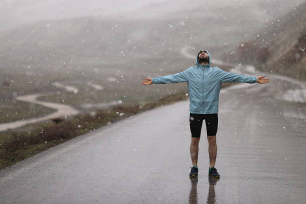 istock Young man exercising on winter day 2102582794