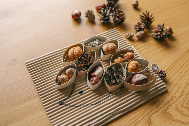 istock Montessori and Sensory Development, A child plays with natural materials 2102604065