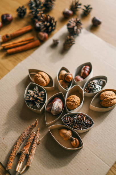 istock Montessori and Sensory Development, A child plays with natural materials 2102604083