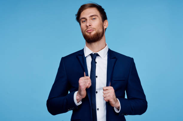 istock business man in suit self confidence financial office blue background 2102606180