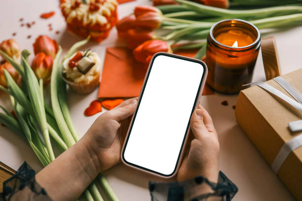 istock Phone with isolated screen on background of spring decor 2102606190