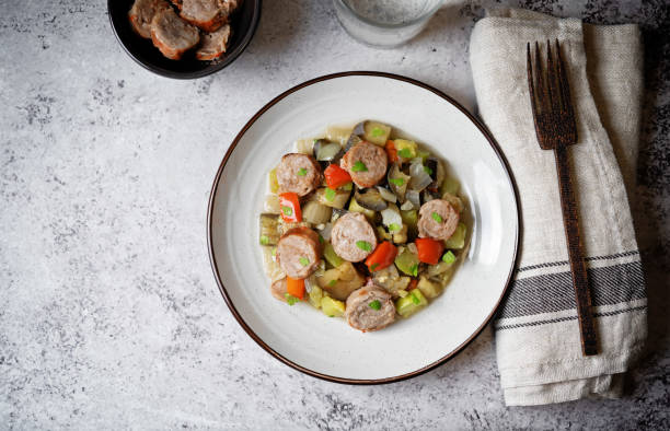 Italian sausages with prepared vegetables. toning. selective focus
