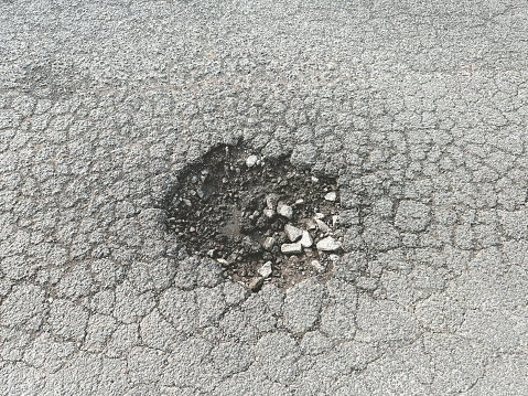 white road marking on an asphalt road