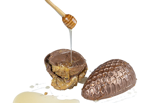 Brazilian Easter egg. With Brazilian honey cake filling and covered with honey.