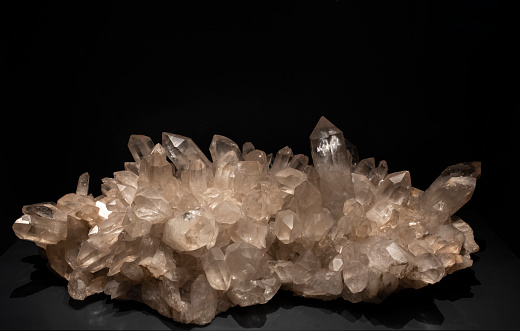 Quartz is known as the stone of power. Black background
