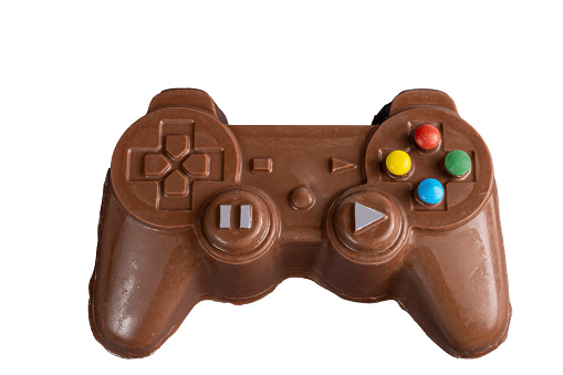Milk chocolate in the shape of a video game controller alongside small rabbits