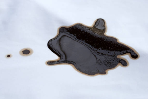istock Dirty coffee stains on white clothes 2102788227