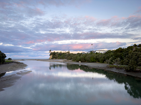 Orewa River, Auckland coastline dusk view