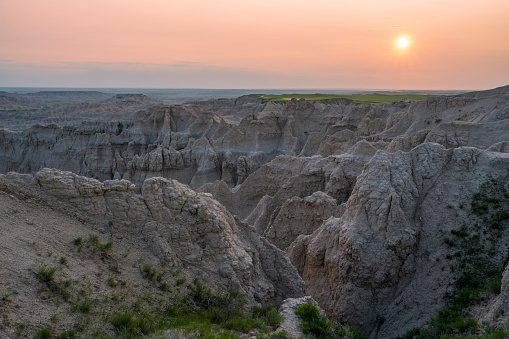 The rocky hill in a desolated area at sunrise in Badlands, South Dakota