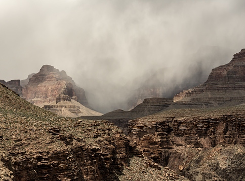 Snow Storm Breaks Over The Rim Over The Tapeats Formations In The Grand Canyon in spring
