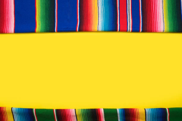 istock Serape on yellow background. Cinco de mayo background. 2102957235