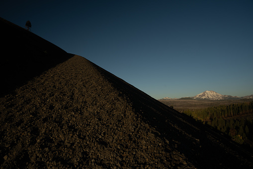Steep Edge of Cinder Cone with Lassen Peak in the distance
