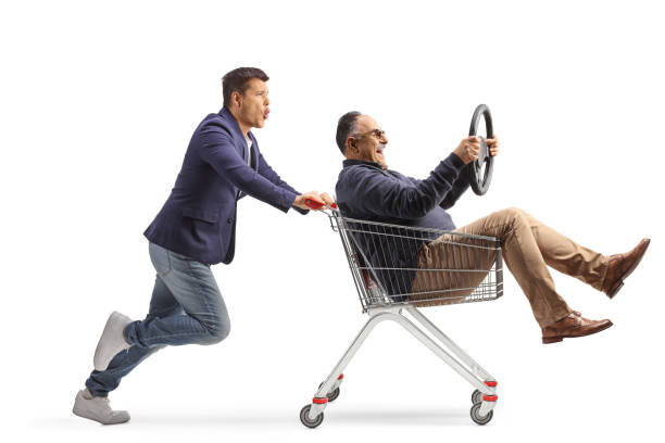 istock Men riding inside a shopping cart 2102993080