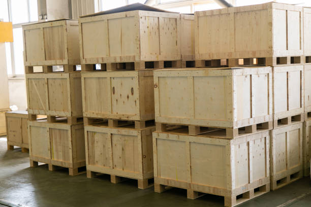 istock wooden crates in the warehouse. Warehousing concept 2102994837