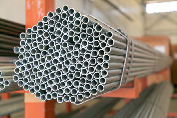 istock Abstract close up of a stack of steel pipes. 2102995934