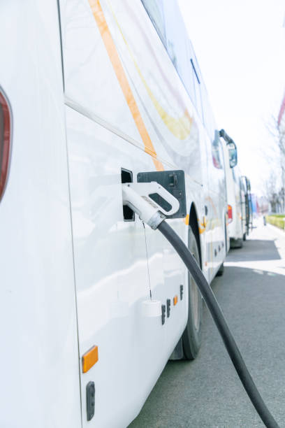 istock A electrical car in charging position connected to charging piles 2102997692