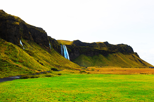 Iceland: Seljalandsfoss Waterfall originates underneath the famous glacier Eyjafjallajökull, and is famous because you can walk behind it. It’s on the Ring Road on the South Coast.