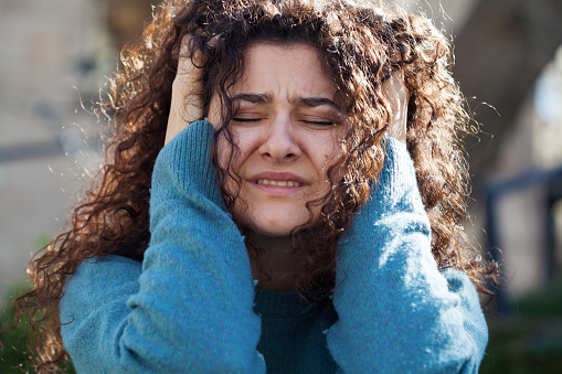 Young woman suffering from mental health issues