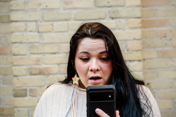 istock Tech Savvy Identity: Indigenous LGBT Woman Embracing Modernity 2103030961