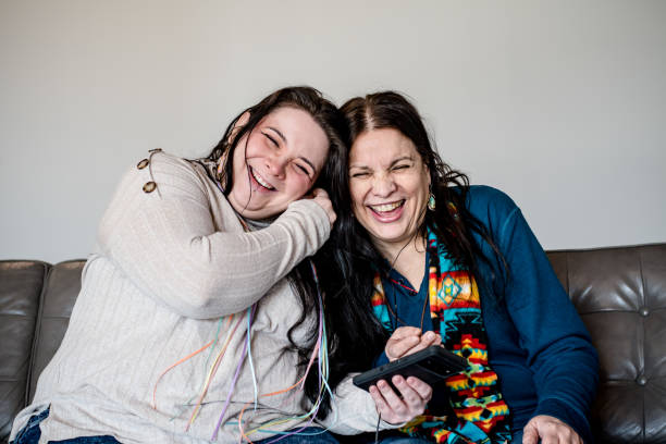 istock Unified in Sound: Indigenous Mother-Daughter Duo Embrace Tech and Togetherness 2103030981