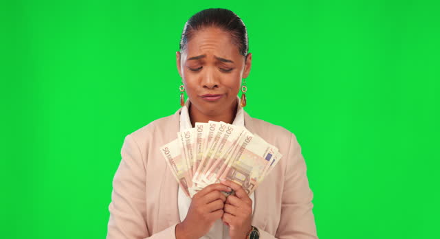 Money, scared and woman on green screen for debt problem, financial decision and savings, inflation or payment risk. Cash, loan and woman with stress face for finance and bills on a studio background