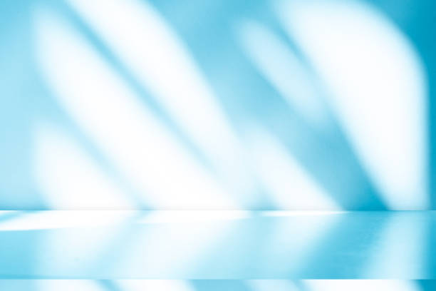 istock Wall interior background, studio, and backdrops show products. with shadow from window color white and blue light. background for text insertion and presentation of product 2103244759