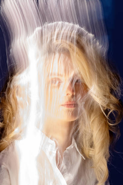 istock Abstract woman studio portrait with light painting technique 2103245301