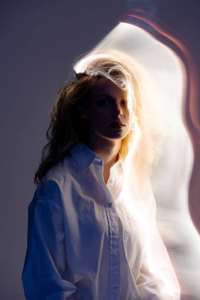 istock Abstract woman studio portrait with light painting technique 2103245807
