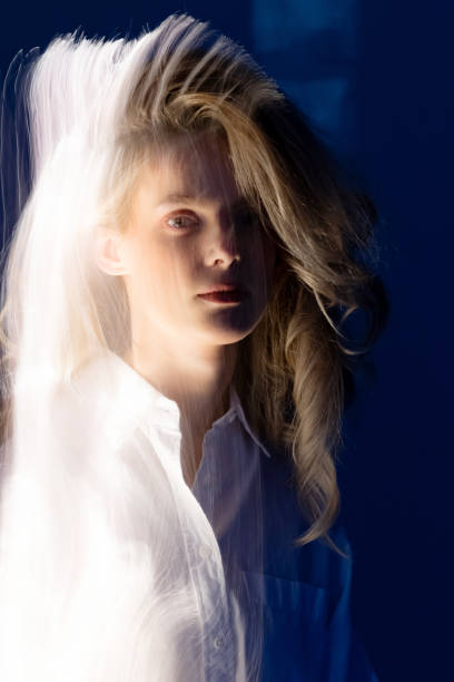 istock Abstract woman studio portrait with light painting technique 2103245808