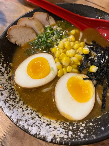 istock Close up detail of curry ramen with egg and corn 2103259699