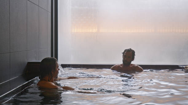 istock Men Relaxing in Warm Onsen Water 2103320170