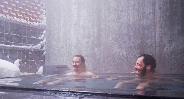 istock Men in Onsen Pool on Snowy Morning 2103320727