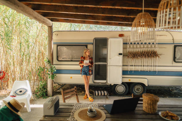 istock Woman in her camper van 2103401570