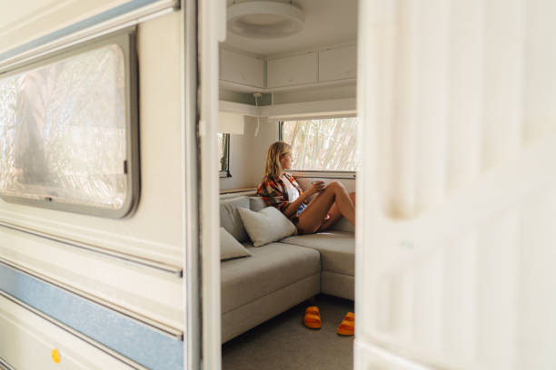 istock Woman in her camper van 2103401672