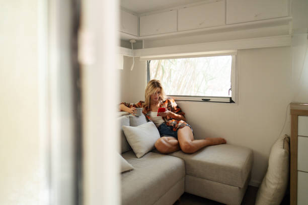 istock Woman in her camper van 2103401797