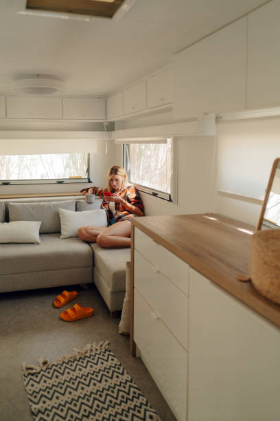 istock Woman in her camper van 2103404457