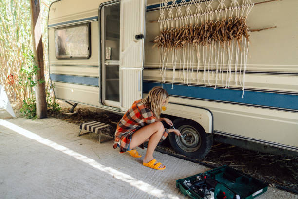 istock Woman in her camper van 2103414429