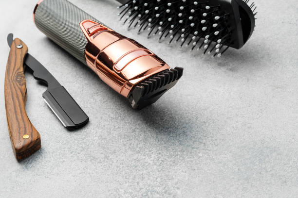 istock Set of hairdressing instruments on gray background 2103429817